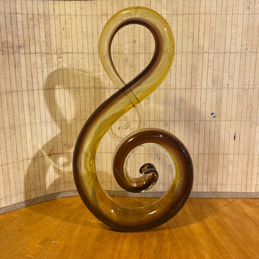 Hand blown treble clef music note